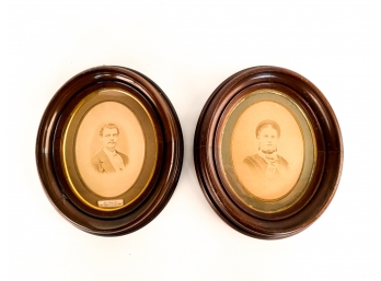 PAIR ANTIQUE PHOTOGRAPH PORTRAITS IN WALNUT FRAMES