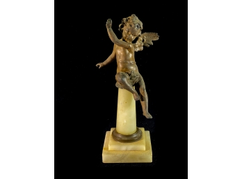 CAST ZINC PUTTI ATOP MARBLE PLINTH