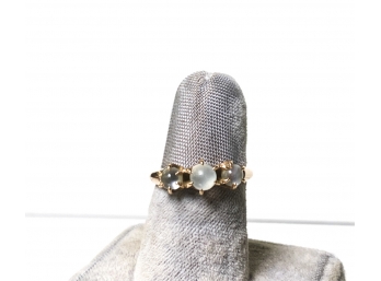 14K GOLD RING SET WITH THREE MOONSTONES