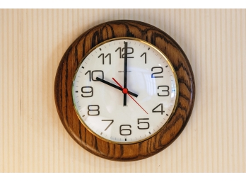 HOWARD MILLER OAK WALL CLOCK