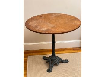 ROUND TOP TABLE ON CAST IRON BASE