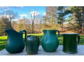 (4) ART POTTERY PITCHERS