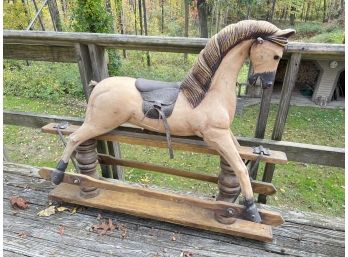 ANTIQUE ROCKING HORSE