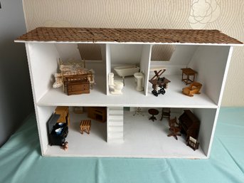 Vintage Children's Dollhouse With Miniature Furniture And Figures