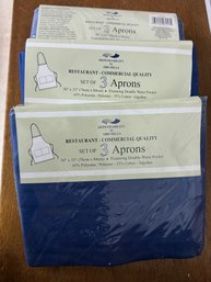 Group Of Commercial Aprons In Original Packaging