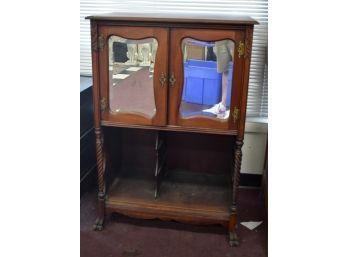 1. Mirrored Curio Cabinet