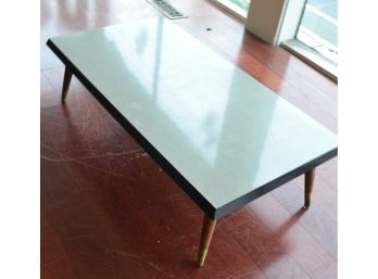 Low Retro Coffee Table With Black Trim And Gray Top