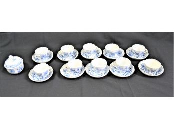 Blue & White Demi Cups And Saucers