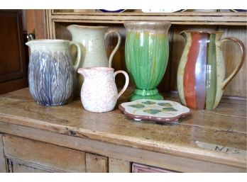 Four Pitchers/ One Vase/One Trivet