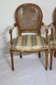 2 Cane Backed Upholstered Arm Chairs.  (A-46)