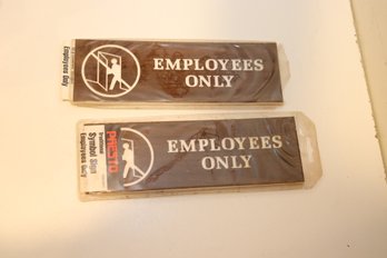 Pair Of Employees Only Signs