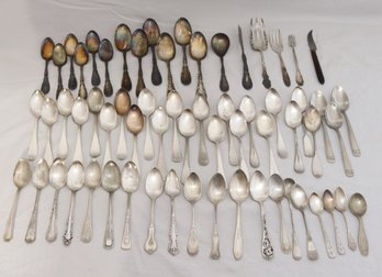 Assorted Vintage Spoons And Some Serving Pieces