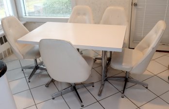 Vintage White Table With Chrome Base With 5 Spinning Chairs