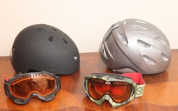 Pair Of Helmets And Ski Goggles