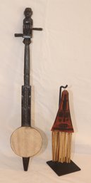 Indonesia Lute And Wind Chime(?) On Metal Stand.    (J-36)