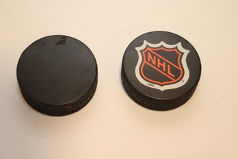 Pair Of NHL Hockey Pucks Canadian Society Of NY(H-21)