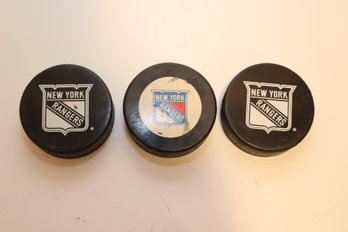 3 NY Rangers NHL Hockey Pucks (H-19)