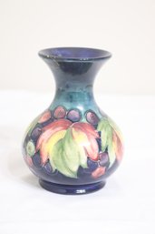 William Moorcroft Pottery Blue Leaf And Berry Vase