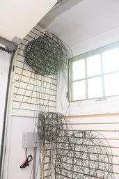 A Bunch Of Plant Wire Metal Stands