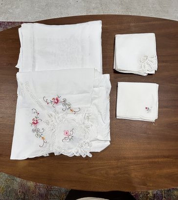 Grouping Of Ivory Embroidered Tablecloths & Napkins (9-piece Set)