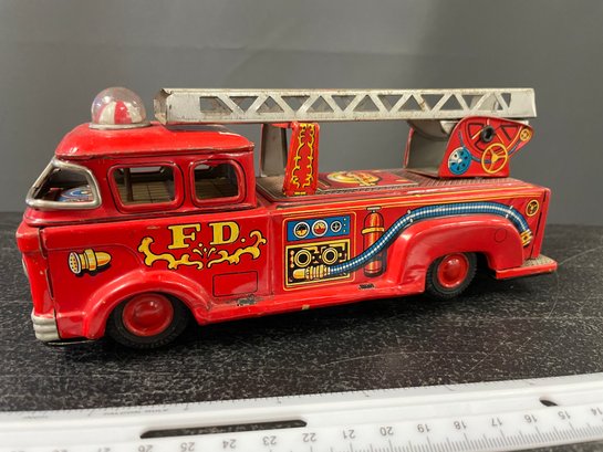 JAPAN TIN LITHO FIRE TRUCK W/ACTION