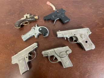 LOT OF TOY CAP PISTOLS GUNS HUBLEY, ZEE, CHAMP ETC