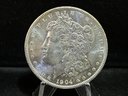 1904 O Morgan Silver Dollar - Almost Uncirculated