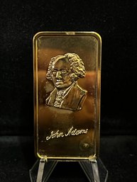 The Hamilton Mint American Presidents 'John Adams' Gold Plated One Troy Ounce .999 Fine Silver Bar