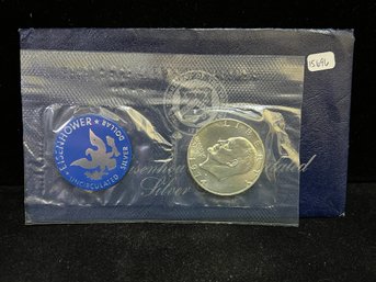 1974 U.S. Mint Eisenhower San Francisco Uncirculated Dollar Blue Envelope