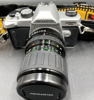 PROMASTER 2500 PK Super 35mm Camera With Lense, Kodak Strap & Leather Case - (LR)