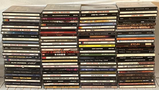 Over 100 Compact Discs - (GU)