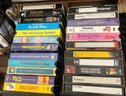 Multiple Stacked Storage Containers Filled With 158 VHS Movies