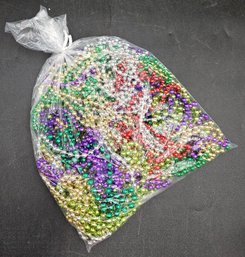 1 Bag Of Mardi Grass Beads In Assorted Colors - (TG2)