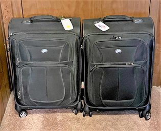 2 American Tourists Rolling Luggage