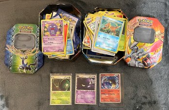 2 Metal Tins Full Of Pokemon Cards