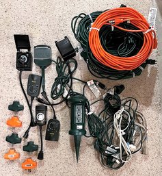 Large Lot Of Extension Cords, Timers And Three Way Outlet Extenders In Storage Tote