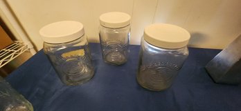 Three Glass Jars With Lids