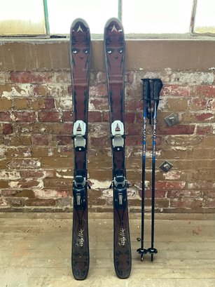 Pair Of Kids Skis And Poles