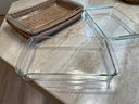 Grouping Of Pyrex Glass Baking Dishes Incl. Wicker Holders