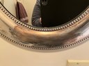 Pair Of Oval Silver Framed Mirrors