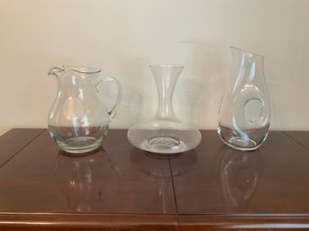 Grouping Of Glass Beverage Pitchers