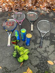 Grouping Of Tennis Rackets And Balls