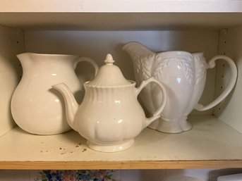 Grouping Of White Ceramic Pitchers