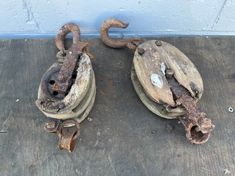 (2) Wood And Metal Pulleys