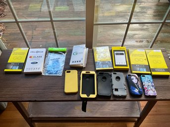 Grouping Of Tempered Glass Screen Protector And Cases