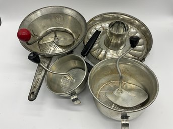 Grouping Of Vintage Sifters And Cake Pan