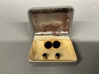 Pair Of Gold And Black Cufflinks