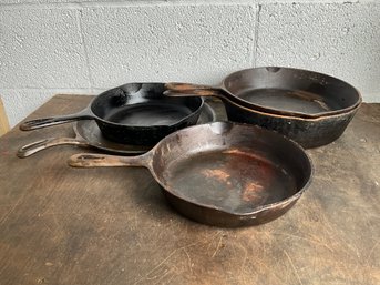 Grouping Of Cast Iron Cookware