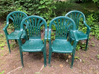 Grouping Of Green Patio Chairs