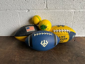 Grouping Of Footballs And Foam Balls